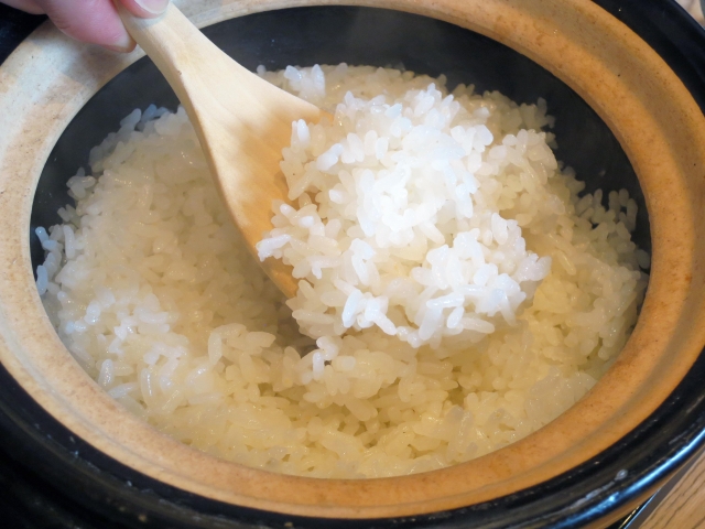 Freshly cooked Japanese rice in a traditional donabe pot