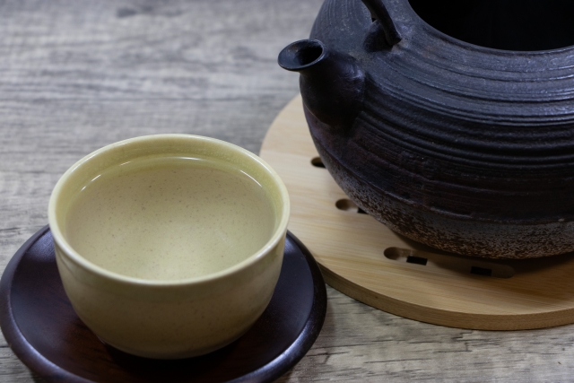 Hot water cooling in a teacup before brewing sencha.