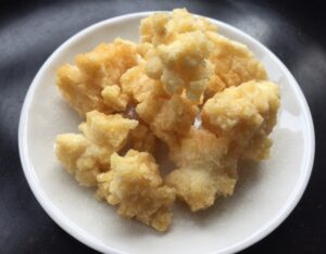 alt="Aged mochi pieces fried until crisp, a simple snack made from leftover mochi after the New Year season"

