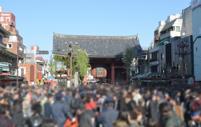 Crowds of people visiting a Japanese shrine for Hatsumode, the first prayer of the New Year.