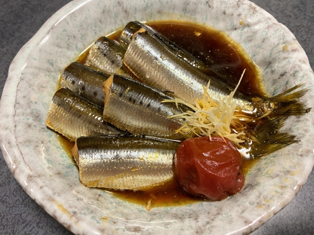 Simmered sardines with umeboshi (iwashi no ume-ni) served in a soy-based sauce