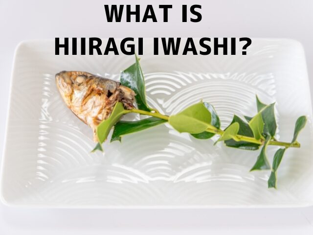 Hiiragi iwashi on a plate: a grilled sardine head attached to a sprig of holly leaves