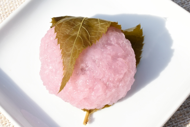Round Dōmyōji-style sakura mochi wrapped in a cherry leaf
