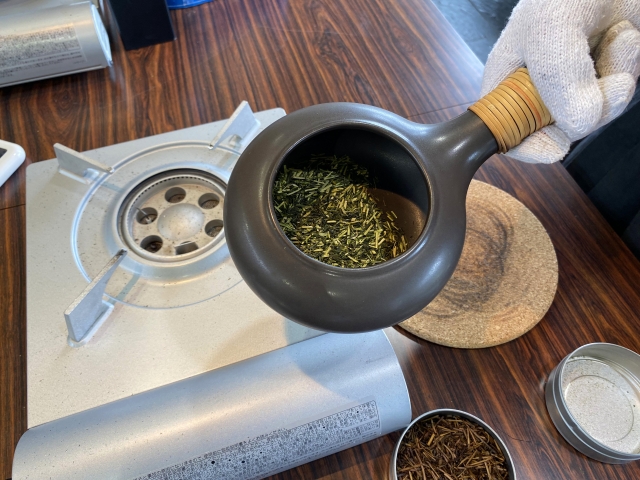 Roasting green tea leaves in a clay pot to make hojicha
