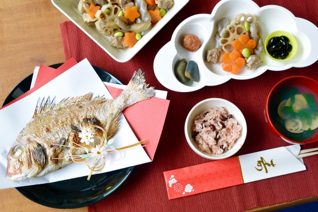 Traditional Japanese celebratory meal featuring sekihan and whole sea bream (tai)