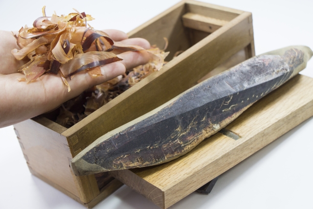 traditional Japanese kezuriki tool used to shave katsuobushi flakes from a dried bonito block