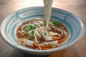 Kishimen noodles in a soy sauce and dashi-based broth from Nagoya