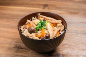 Takikomi gohan Japanese seasoned rice cooked with vegetables and dashi