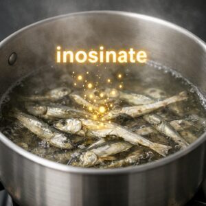 Niboshi simmering in water as inosinate dissolves into the broth
