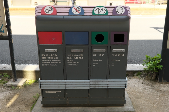 Multi-compartment recycling bins in Japan for paper, plastics, cans, and PET bottles