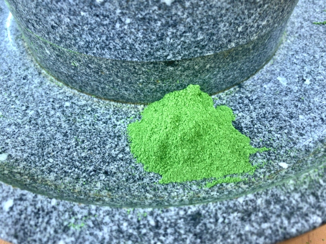 Freshly ground matcha powder with bright green color and fine consistency