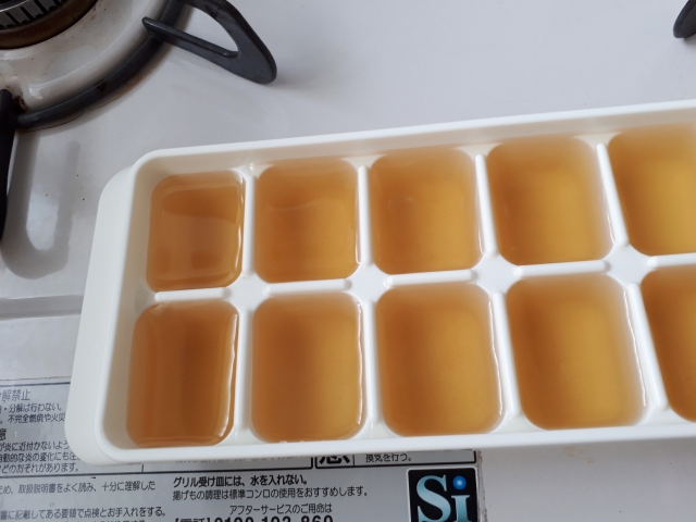 Frozen dashi cubes stored in an ice tray for convenient cooking