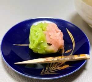Colorful Japanese wagashi sweet on a plate with traditional design