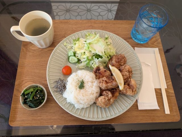 Japanese set meal with water served alongside the food