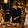 Restaurant staff serving food to customers in Japan
