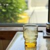 Glass of barley tea served at a Japanese restaurant table