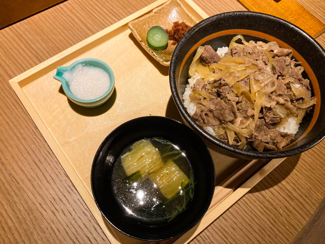 Japanese meal set with rice bowl, soup, and side dishes