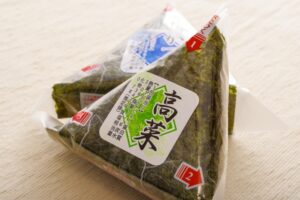 Packaged Japanese convenience store onigiri, showing the type designed to keep the nori separate until opened.