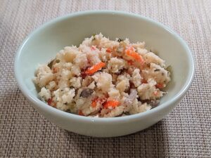 Unohana, a Japanese home-cooked dish made with okara simmered with vegetables, served in a small bowl.