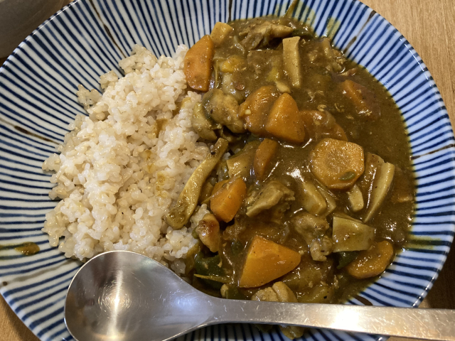 A plate of homemade Japanese curry rice with vegetables and a rich, thick sauce