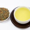 A cup of genmaicha with roasted rice and green tea leavestea.