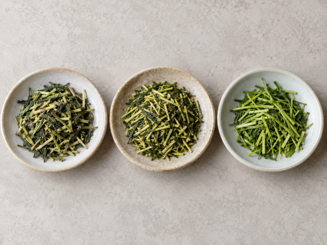 Three different kukicha teas showing variation in stems, leaves, and color