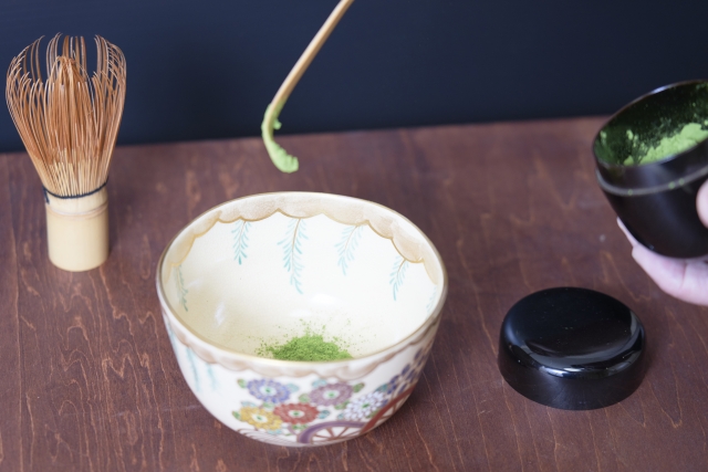 Preparing freshly ground matcha with a chawan, chasen, and chashaku