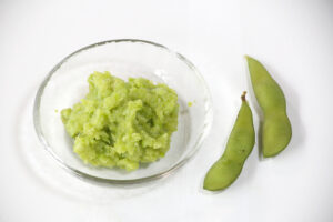 Zunda sweet edamame paste shown with fresh edamame pods