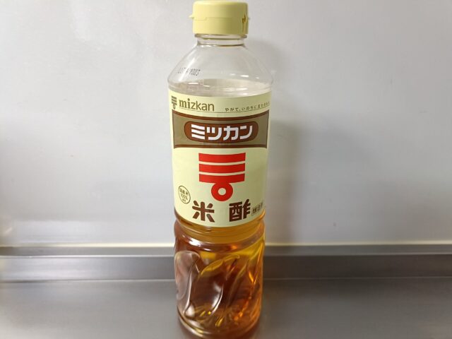 A bottle of unseasoned Japanese rice vinegar for everyday home cooking.